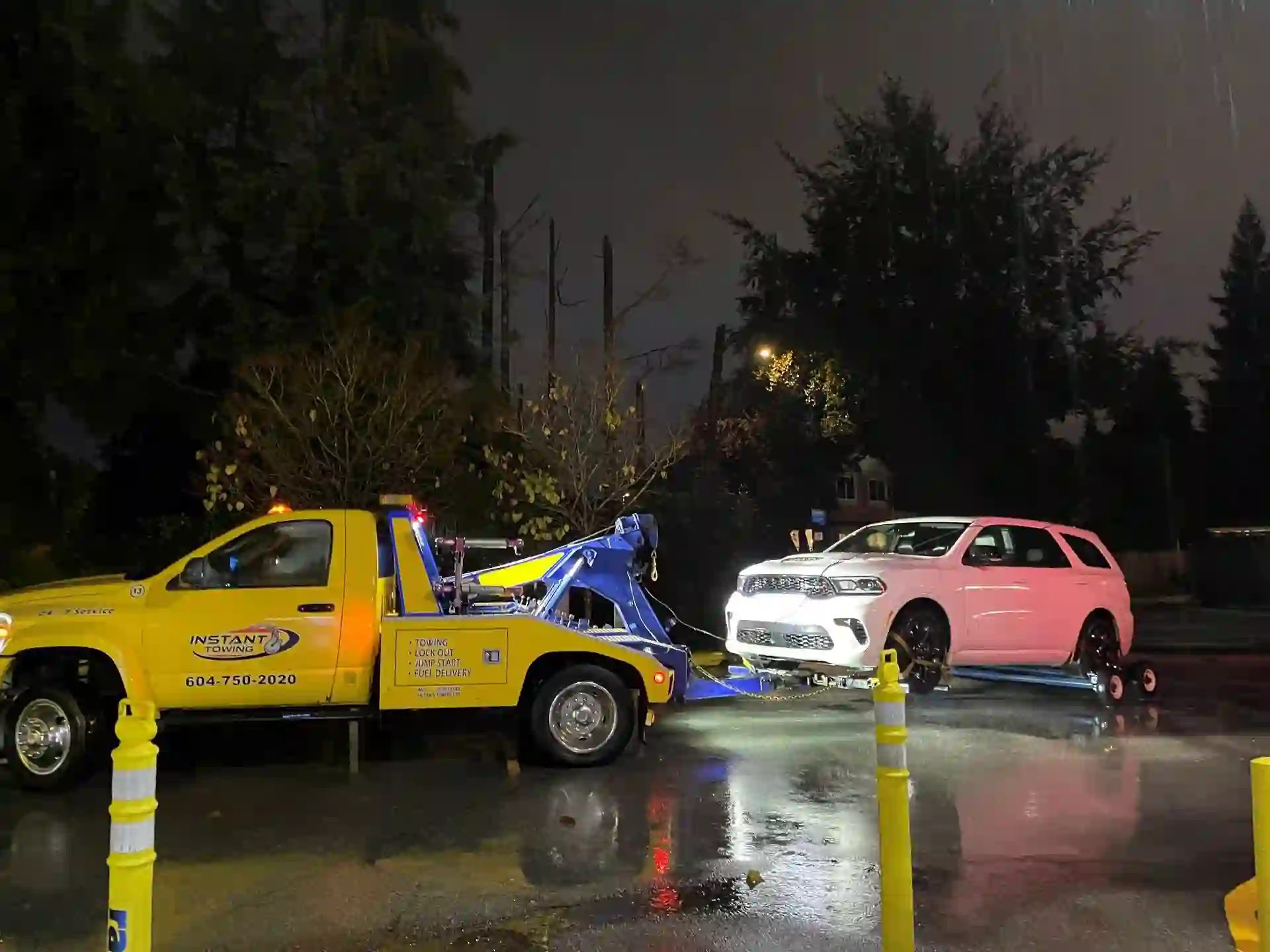 car towing at night in surrey